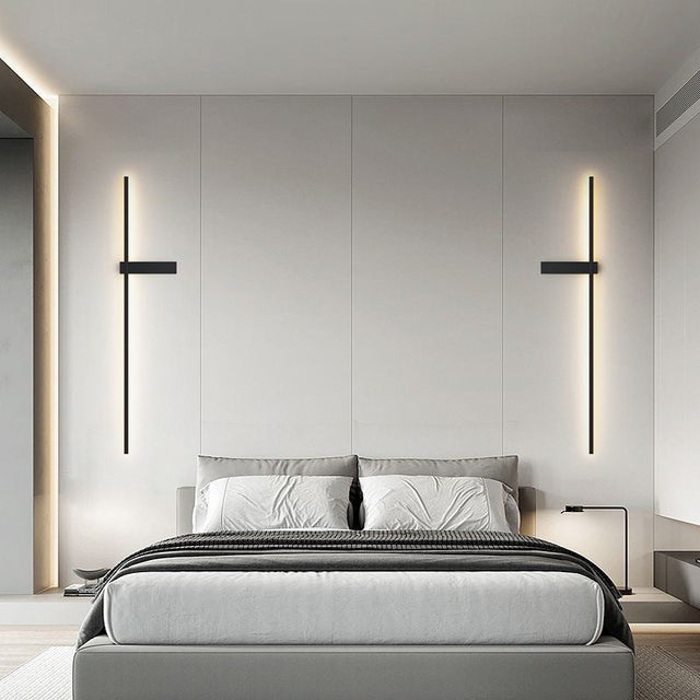 Modern bedroom with a bed and wall lights