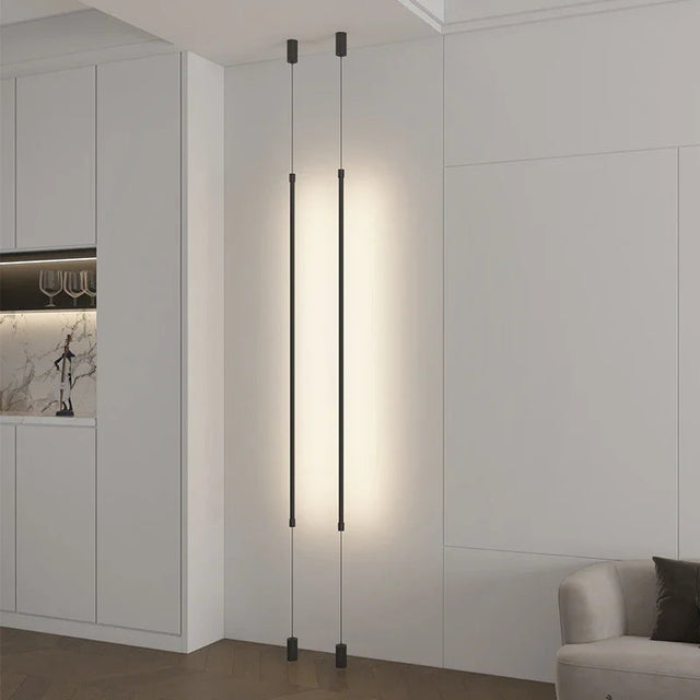 Modern floor lamp with a minimalist design in a living room setting.