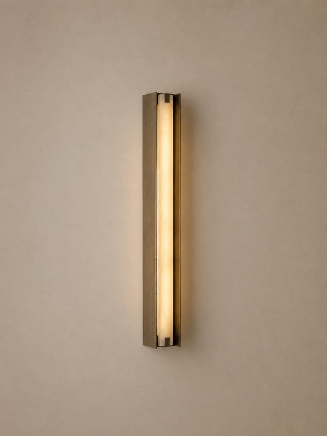 Wall-mounted light fixture on a beige wall