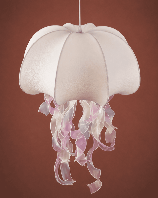 Jellyfish-shaped lamp with white shade and pinkish-purple tentacles on a brown background