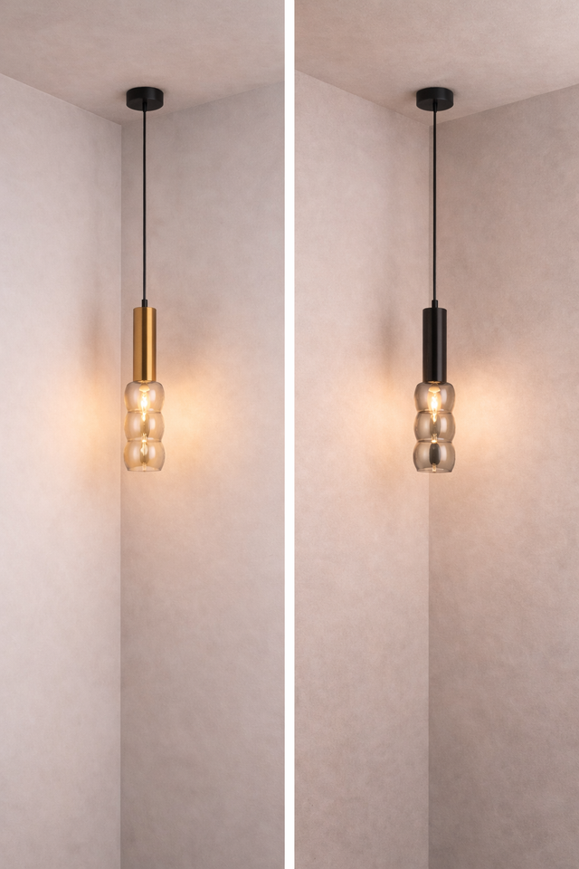 Two pendant lights with different finishes on a neutral wall.