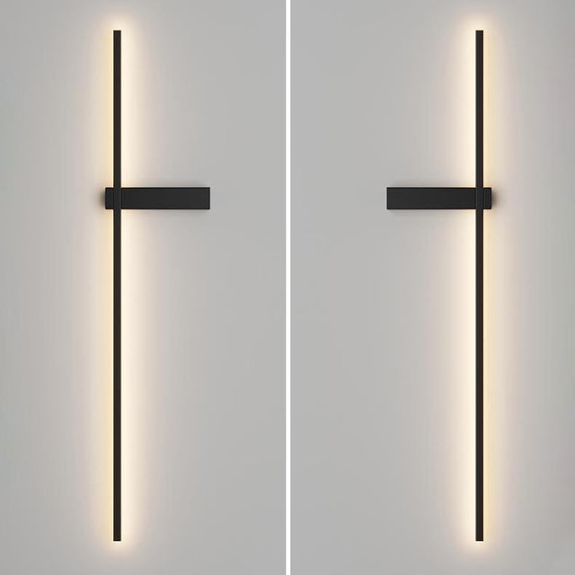 Two modern wall lights with a cross design on a gray background