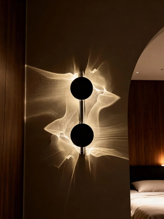 Modern wall lamp with abstract design in a bedroom setting