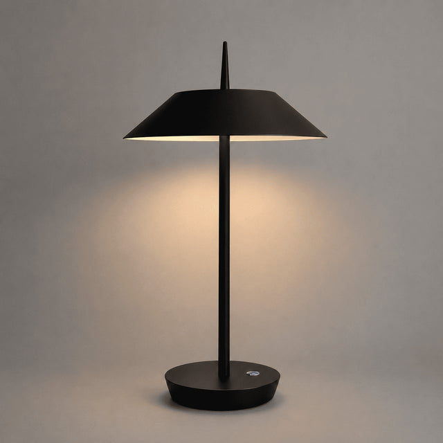 Black table lamp with a minimalist design on a gray background