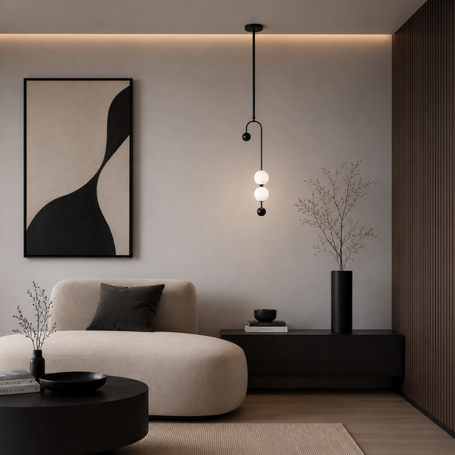 Modern living room with a beige sofa, black coffee table, and abstract art on the wall.