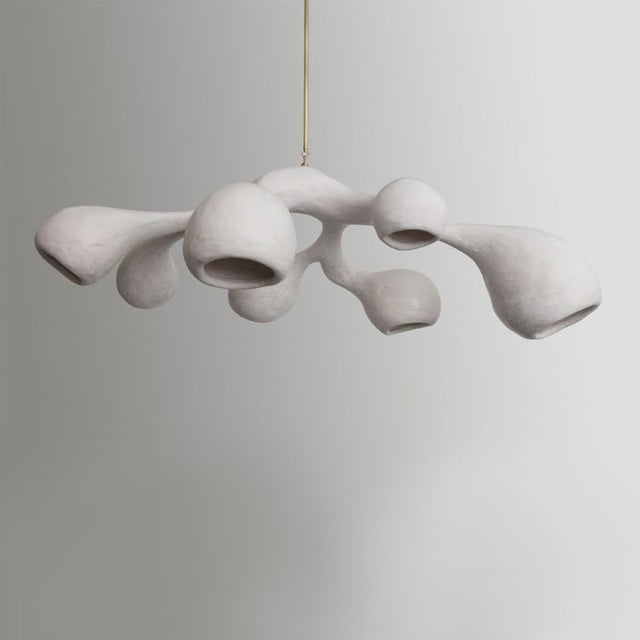 Modern pendant light with organic design on a plain background