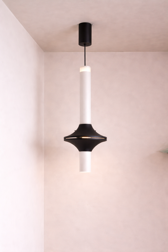 Sleek white pendant Light which will go with a very minimal interior theme